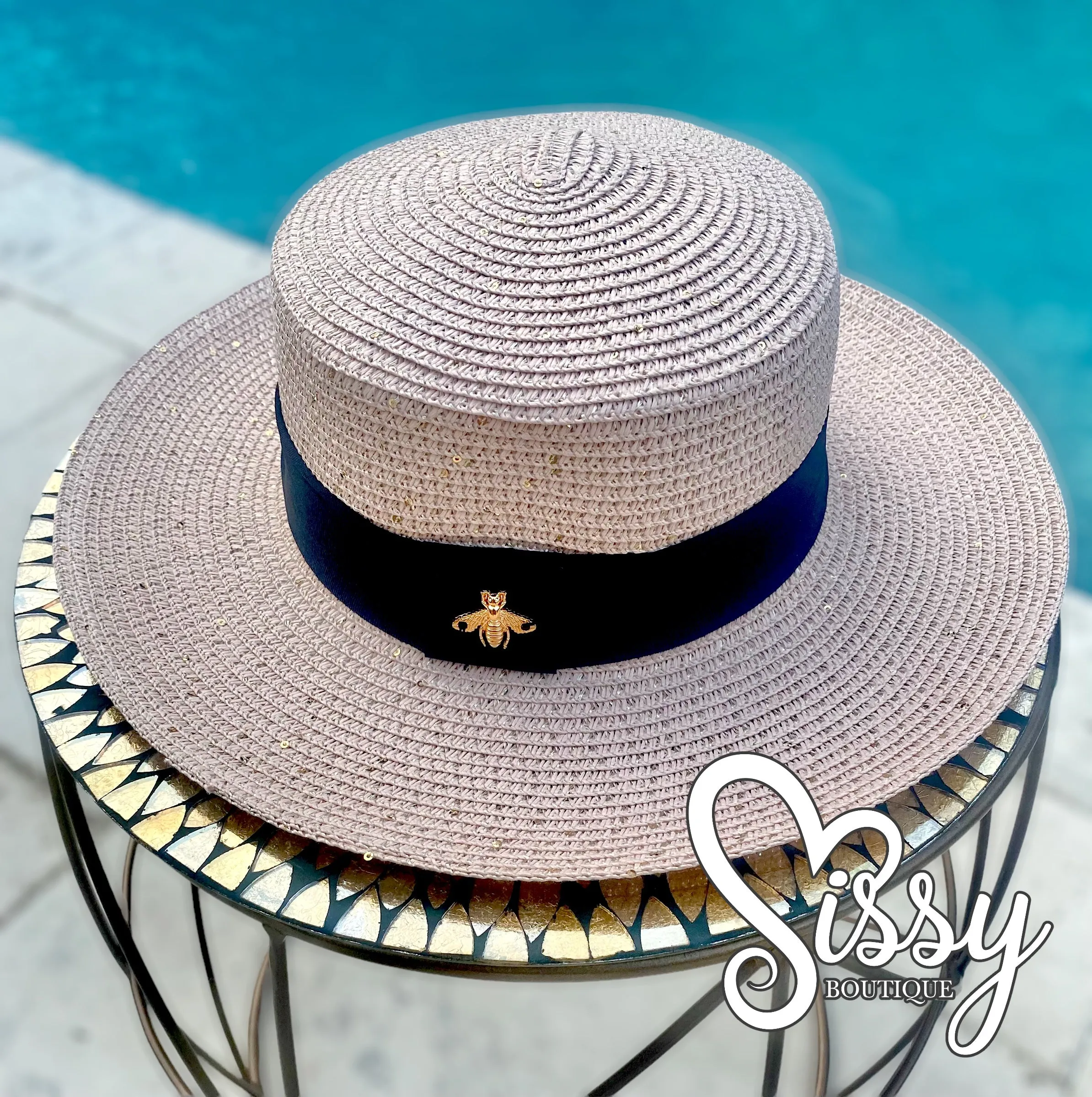 BLUSH SHIMMERY SUN LADIES ADJUSTABLE HAT WITH BLACK BAND AND GOLD BEE CHARM