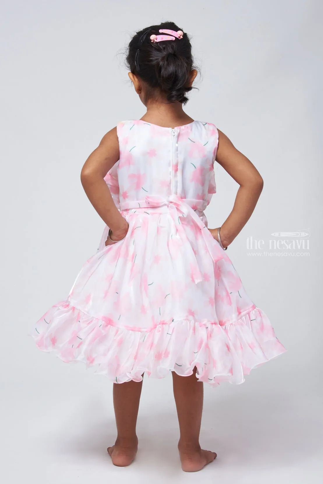 Designer Pink Organza Party Dress: Floral Bow & Flared Detail for Young Girls