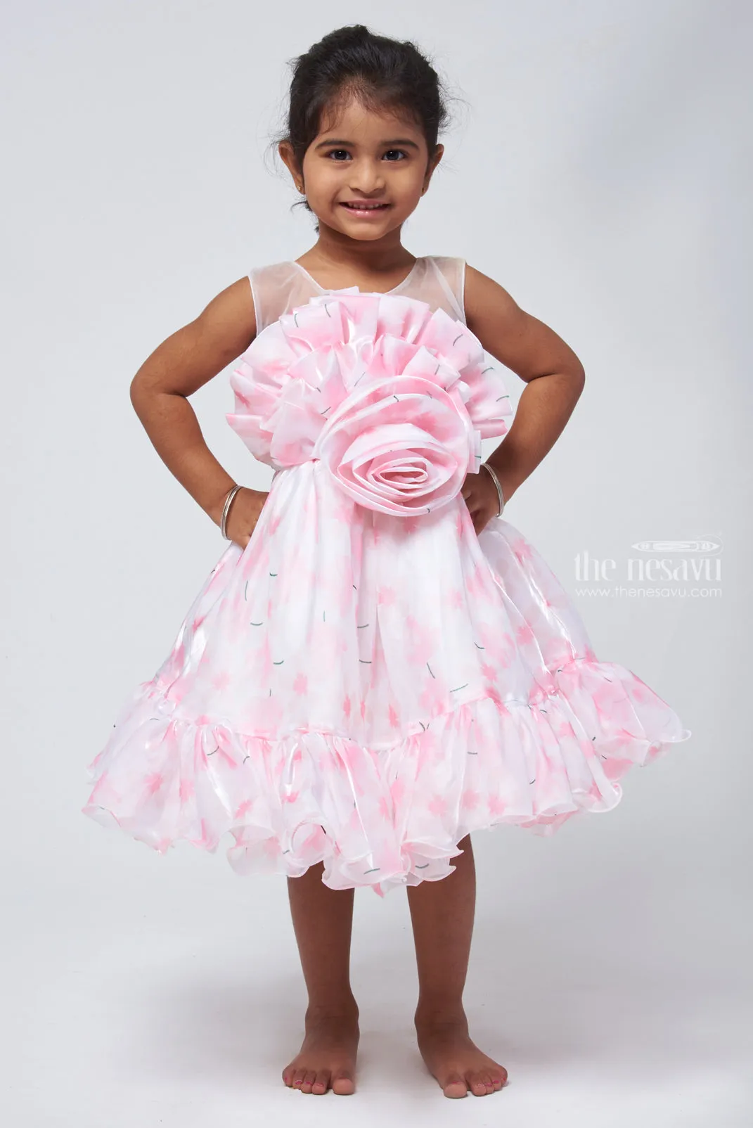 Designer Pink Organza Party Dress: Floral Bow & Flared Detail for Young Girls