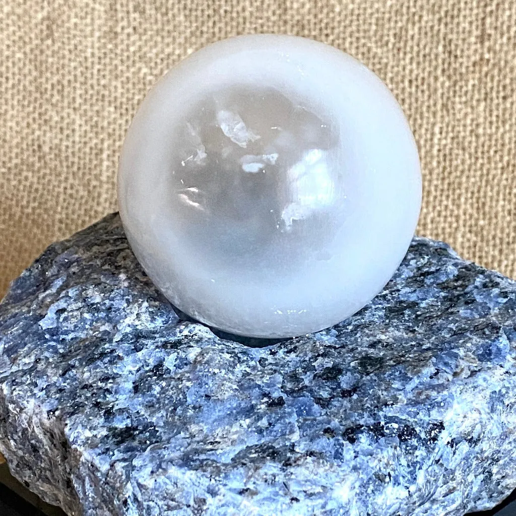 Selenite Sphere & Rough Sodalite Block on Polished Black Shungite Stand